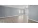 Dining room with gray walls, wood floors, and a chandelier at 609 W Grandview Rd, Phoenix, AZ 85023