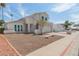 Two-story house with white exterior, two-car garage, and partially visible yard at 609 W Grandview Rd, Phoenix, AZ 85023