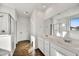 Bathroom with double vanity and walk-in shower at 7423 W Cavalier Dr, Glendale, AZ 85303