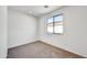 Bright bedroom with neutral carpeting at 7423 W Cavalier Dr, Glendale, AZ 85303