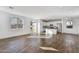 Bright living room with wood-look tile floors at 7423 W Cavalier Dr, Glendale, AZ 85303