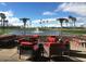 Outdoor patio furniture overlooking a lake and fountain at 9542 E Sunridge Dr, Sun Lakes, AZ 85248