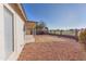 Large backyard with gravel and a view of a golf course at 10831 W Laurie Ln, Peoria, AZ 85345