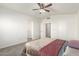 Comfortable bedroom with ample closet space and neutral decor at 10831 W Laurie Ln, Peoria, AZ 85345