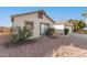 House exterior showcasing a side view and rock landscaping at 10831 W Laurie Ln, Peoria, AZ 85345