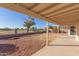 Covered patio overlooking the backyard and golf course at 10831 W Laurie Ln, Peoria, AZ 85345