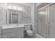 Clean bathroom with shower and white vanity at 10845 W Kaibab Dr, Sun City, AZ 85373