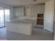 Spacious kitchen featuring granite countertops and an island at 13250 W Eagle Feather Rd, Peoria, AZ 85383