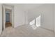 Cozy bedroom featuring plush carpeting, a large closet, and natural light creating a welcoming space at 14778 W Tether Trl, Surprise, AZ 85387