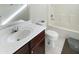 Clean bathroom with a toilet, sink, and bathtub at 16621 S 44Th Pl, Phoenix, AZ 85048