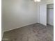 Spacious bedroom with carpet and a sliding door closet at 16621 S 44Th Pl, Phoenix, AZ 85048