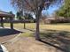 Community park with grassy lawn and mature trees at 16621 S 44Th Pl, Phoenix, AZ 85048