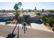 Aerial view of single-story home with desert landscaping and driveway at 17409 N Horseshoe Dr, Surprise, AZ 85374