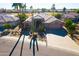 Aerial view of single-story home with desert landscaping and large cacti at 17409 N Horseshoe Dr, Surprise, AZ 85374