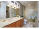 Updated bathroom with a shower and modern vanity at 17409 N Horseshoe Dr, Surprise, AZ 85374