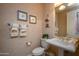 Charming half bathroom with pedestal sink at 17409 N Horseshoe Dr, Surprise, AZ 85374