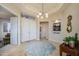 Bright and airy entryway with high ceilings and a circular rug at 17409 N Horseshoe Dr, Surprise, AZ 85374