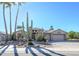 Single story home with a large front yard and desert landscaping at 17409 N Horseshoe Dr, Surprise, AZ 85374