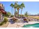 Outdoor patio with fire pit and seating, perfect for entertaining at 17409 N Horseshoe Dr, Surprise, AZ 85374