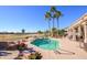 Relaxing pool and spa area with patio furniture, offering scenic golf course views at 17409 N Horseshoe Dr, Surprise, AZ 85374