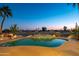 Stunning pool and spa at dusk, overlooking the golf course at 17409 N Horseshoe Dr, Surprise, AZ 85374