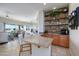 Wet bar with granite countertop and stone backsplash at 17409 N Horseshoe Dr, Surprise, AZ 85374