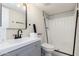 Modern bathroom with gray vanity and a shower at 17830 N 30Th St, Phoenix, AZ 85032