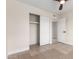 Bedroom with tile floors, ceiling fan and sliding closet doors at 17830 N 30Th St, Phoenix, AZ 85032