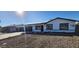 Modern home exterior with solar panels and a landscaped yard at 17830 N 30Th St, Phoenix, AZ 85032