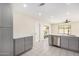 Gray shaker cabinets and stainless steel appliances in this kitchen at 17830 N 30Th St, Phoenix, AZ 85032