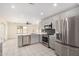 Modern kitchen features stainless steel appliances and an island at 17830 N 30Th St, Phoenix, AZ 85032