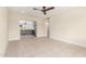 Open living room with kitchen views and tile floors at 17830 N 30Th St, Phoenix, AZ 85032