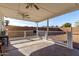 Covered patio with ceiling fans and backyard access at 17830 N 30Th St, Phoenix, AZ 85032