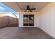 Covered patio with sliding glass doors and ceiling fan at 17830 N 30Th St, Phoenix, AZ 85032