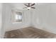 Bright bedroom with ceiling fan and neutral carpeting at 1941 S Pierpont Dr # 2098, Mesa, AZ 85206