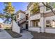 Attractive exterior of a two-story condo building with stairs leading to entrance at 1941 S Pierpont Dr # 2098, Mesa, AZ 85206