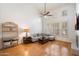 Spacious living room featuring high ceilings and natural light from multiple windows at 20802 N Grayhawk Dr # 1087, Scottsdale, AZ 85255