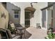 Cozy outdoor patio with seating, a table, and plants at 20802 N Grayhawk Dr # 1087, Scottsdale, AZ 85255