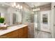 Elegant bathroom with walk-in shower and modern vanity at 21609 N 159Th Ln, Sun City West, AZ 85375