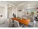 Elegant dining area with wood table and modern chairs at 21609 N 159Th Ln, Sun City West, AZ 85375