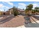 Single-story home with drought-tolerant landscaping and a large front yard at 21609 N 159Th Ln, Sun City West, AZ 85375