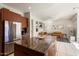 Updated kitchen featuring granite countertops and wood cabinets at 21609 N 159Th Ln, Sun City West, AZ 85375