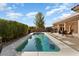 Inviting rectangular pool with patio and seating area at 21609 N 159Th Ln, Sun City West, AZ 85375