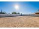 Large backyard with a blank canvas for landscaping at 21951 E Misty Ln, Queen Creek, AZ 85142