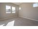 Bright bedroom with neutral walls and tile flooring at 21951 E Misty Ln, Queen Creek, AZ 85142