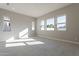 Bright bedroom with neutral walls and tile flooring, and many windows at 21951 E Misty Ln, Queen Creek, AZ 85142