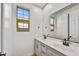 Modern bathroom with double vanity and sleek fixtures at 31381 N 130Th Ave, Peoria, AZ 85383