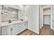 Elegant bathroom with double vanity and light-colored cabinets at 31381 N 130Th Ave, Peoria, AZ 85383