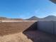 Landscaped backyard with mountain views and block wall at 33333 N 132Nd Dr, Peoria, AZ 85383