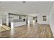 Modern kitchen with white cabinets and granite countertops at 33333 N 132Nd Dr, Peoria, AZ 85383